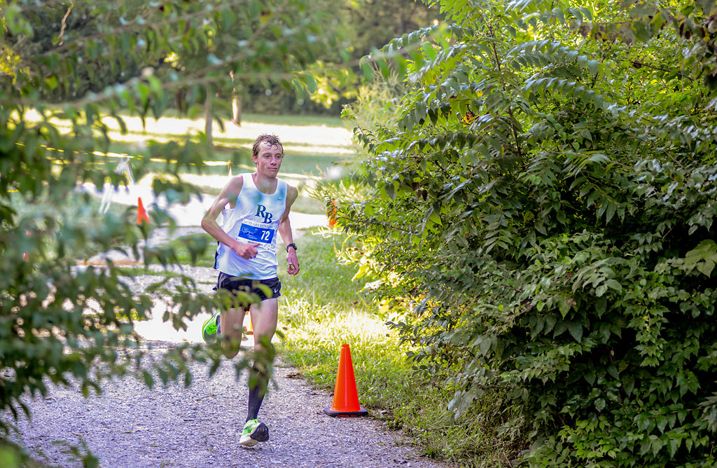 Griffin Humphreys runs toward the finish line